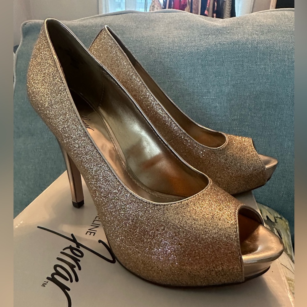 One pair size 8 Jacqueline Ferrar rose gold shoes.